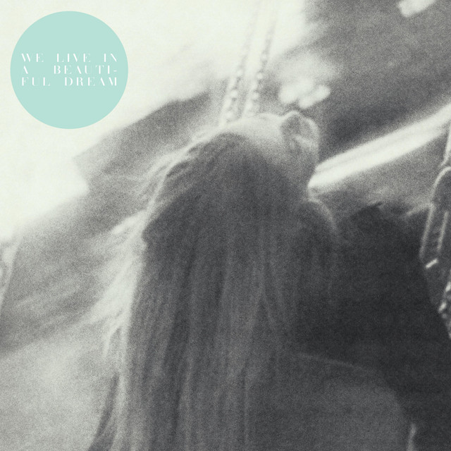 We Live in a Beautiful Dream cover art