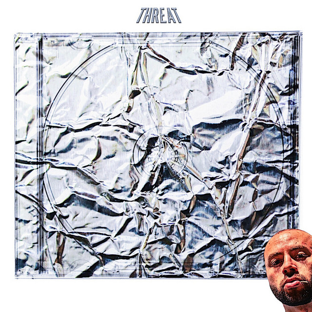 Threat cover art
