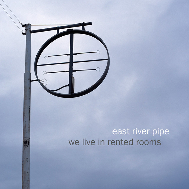 Omslag för We Live In Rented Rooms av East River Pipe