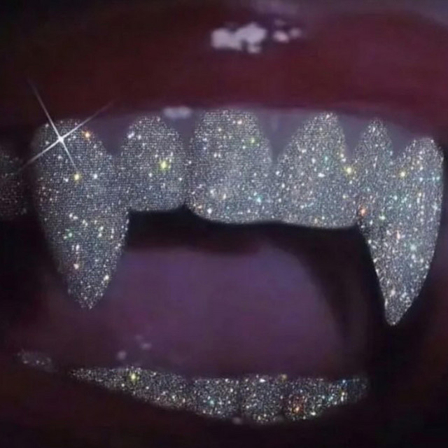 GOLD FANGS cover art