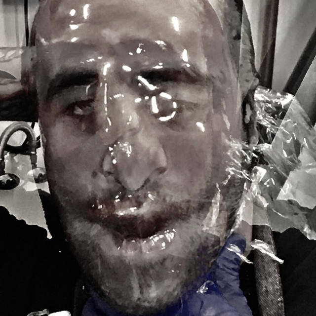 WRAPPED IN PLASTIC cover art
