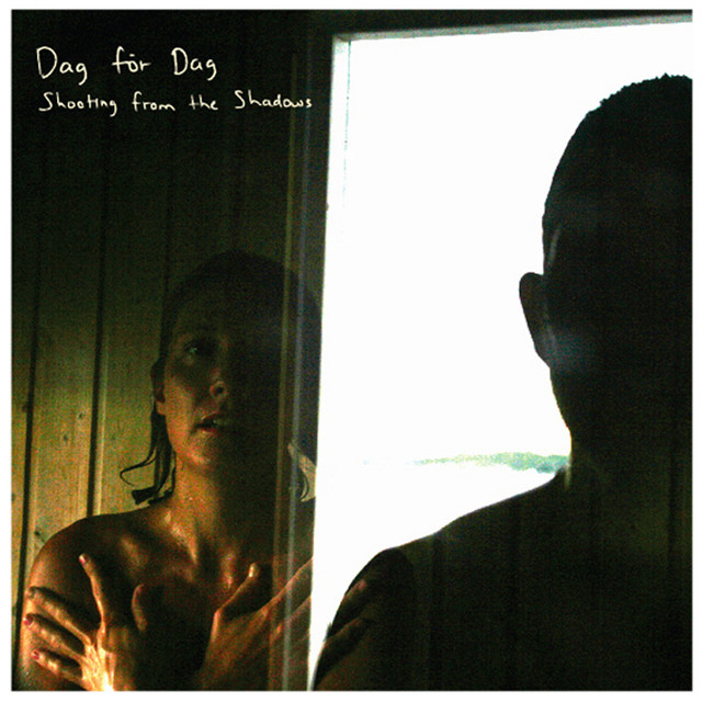 Omslag för Shooting From The Shadows av Dag För Dag