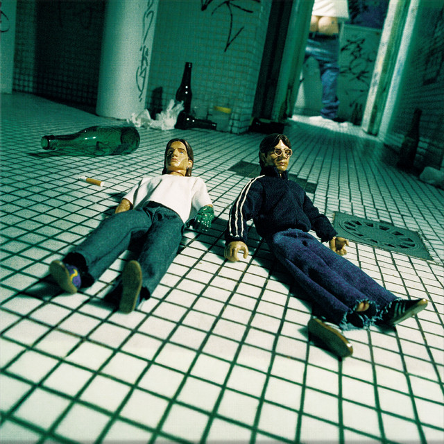 Mil Pequeños Cortes cover art