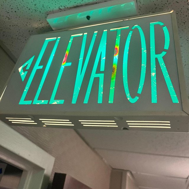 Elevator cover art