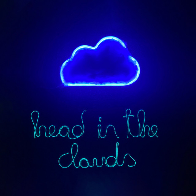 Head In The Clouds cover art