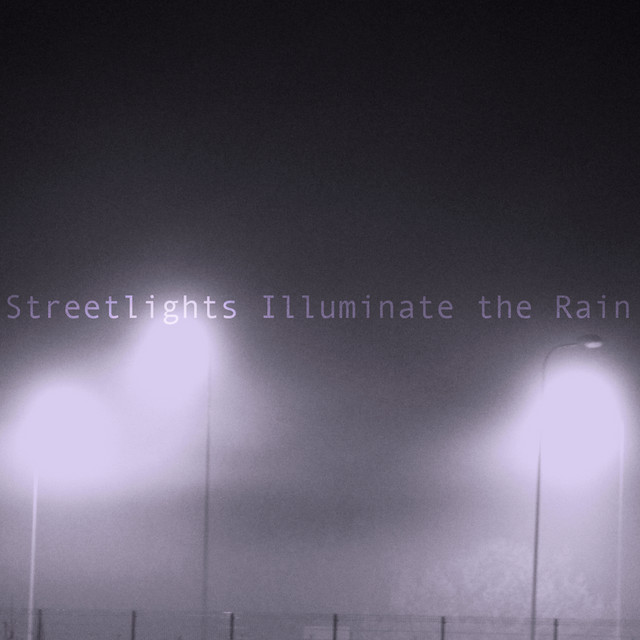 Streetlights Illuminate the Rain cover art