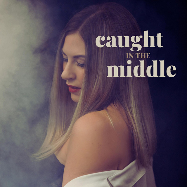 Caught in the Middle - Single by Oghamyst | Spotify
