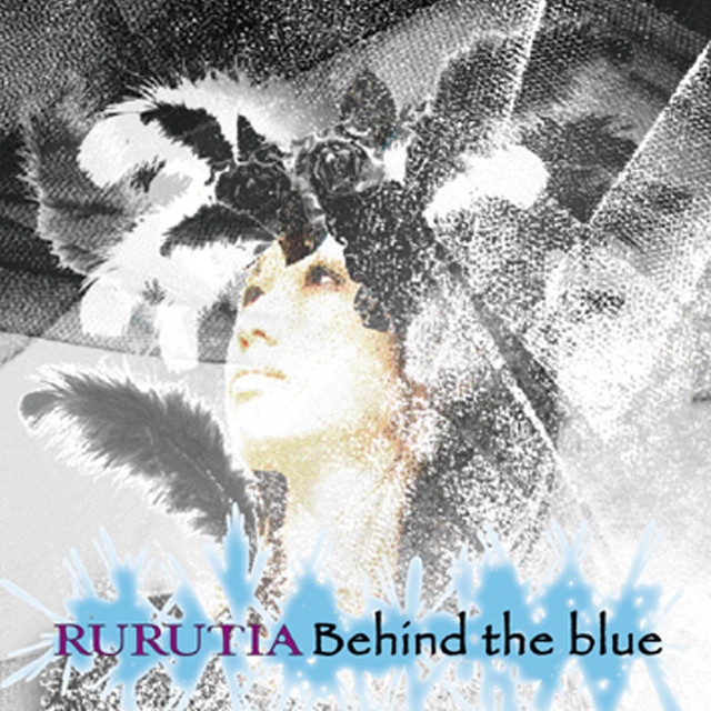 Behind the blue cover art