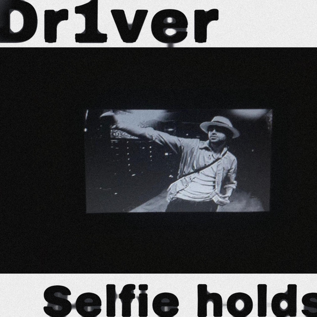 Selfie holds cover art