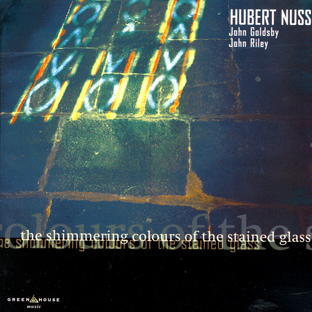 The Shimmering Colours Of The Stained Glass cover