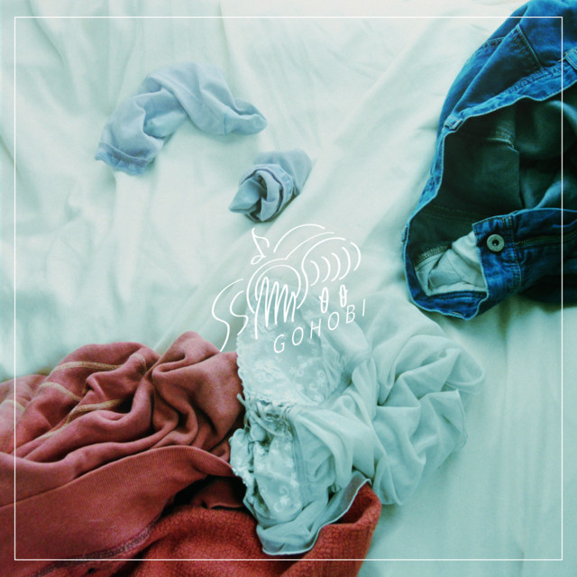 Behind the messy cover art