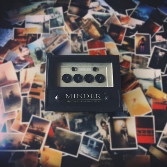Minder cover