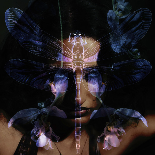 iO. DELUXE cover art