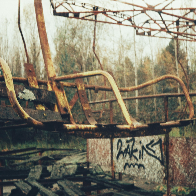 Обкладинка: The Place We've Never Left — Smile, Chaos!