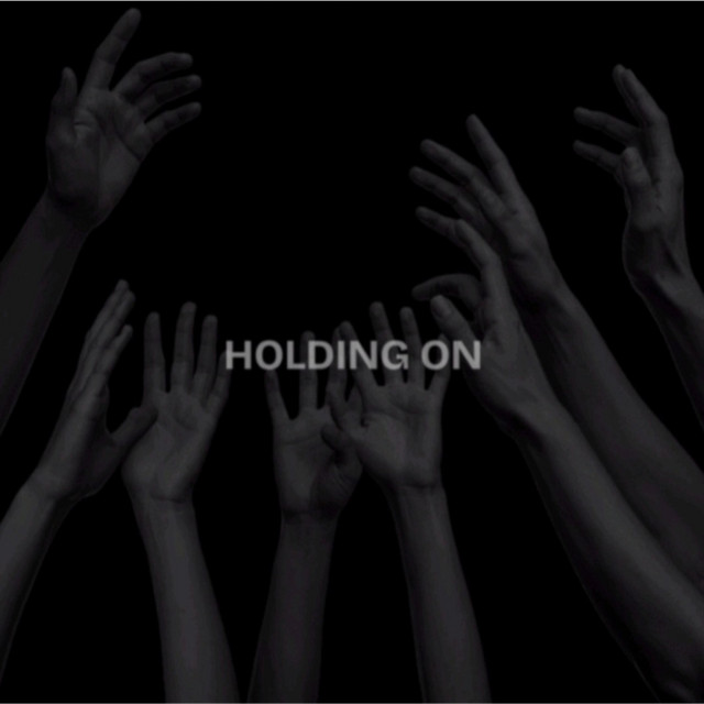 HOLDING ON