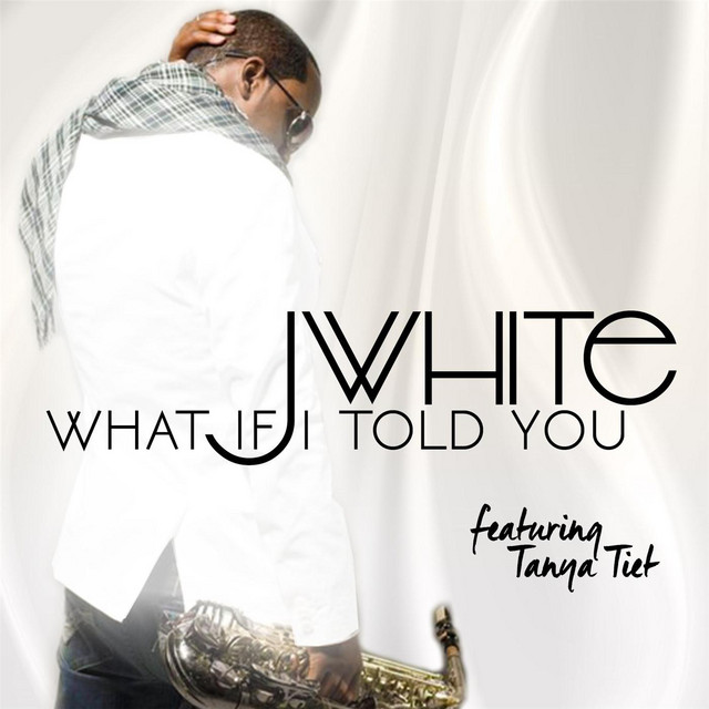 J White