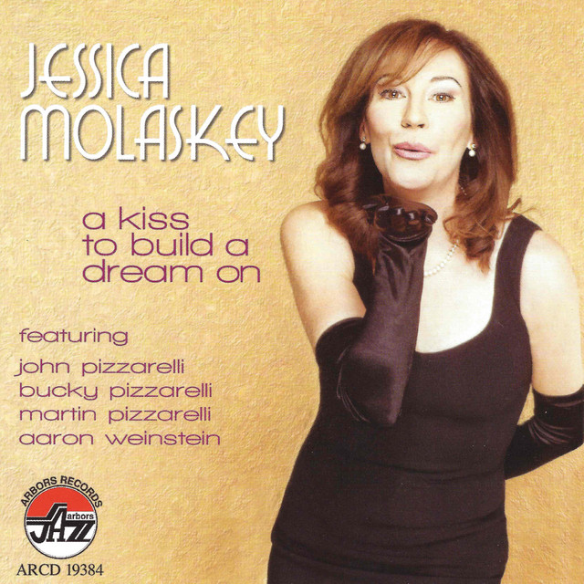 A Kiss To Build A Dream On cover art