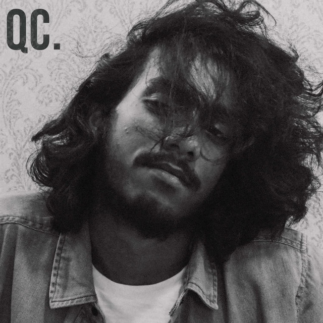QC cover art
