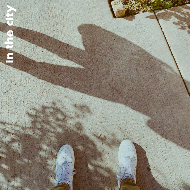 In the City cover art