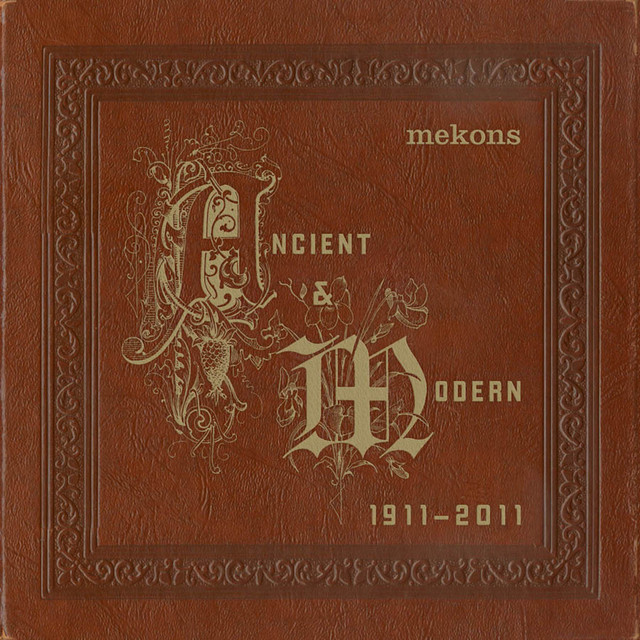 Omslag för Ancient & Modern 1911-2011 av Mekons