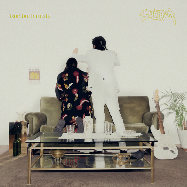 txori bat hiru ate cover art