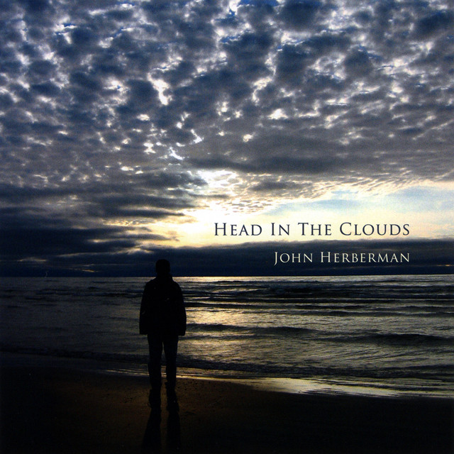 Head In The Clouds cover art