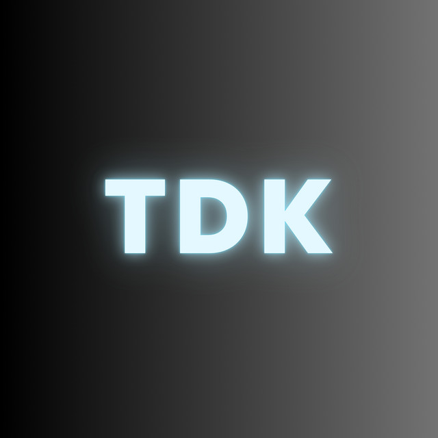 T D K
