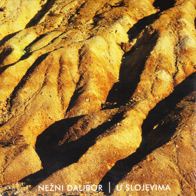 U slojevima cover art