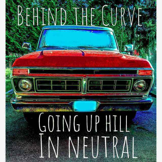 Behind The Curve Going up hill in neutral cover