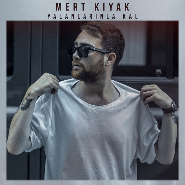 Yalanlarınla Kal cover art