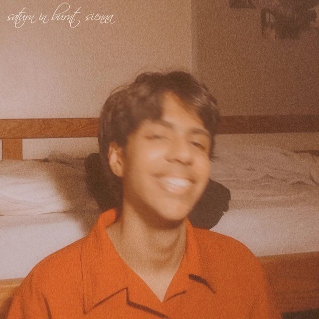 Saturn in burnt sienna cover art