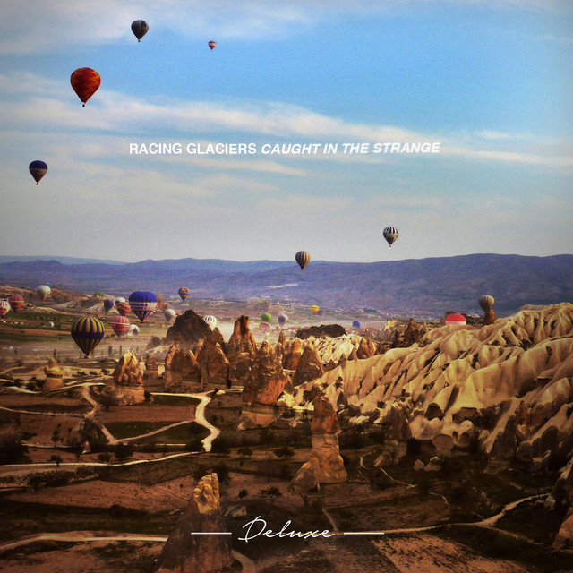 Caught In The Strange (Deluxe) cover art