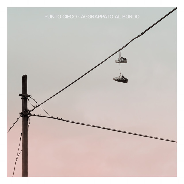 Aggrappato al bordo cover art