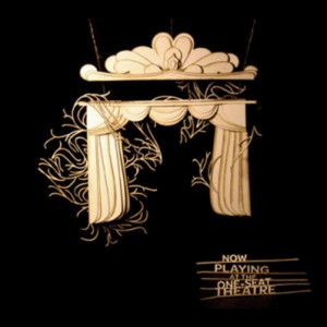 Now Playing at the One-Seat Theatre cover