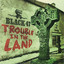 Trouble in the Land cover